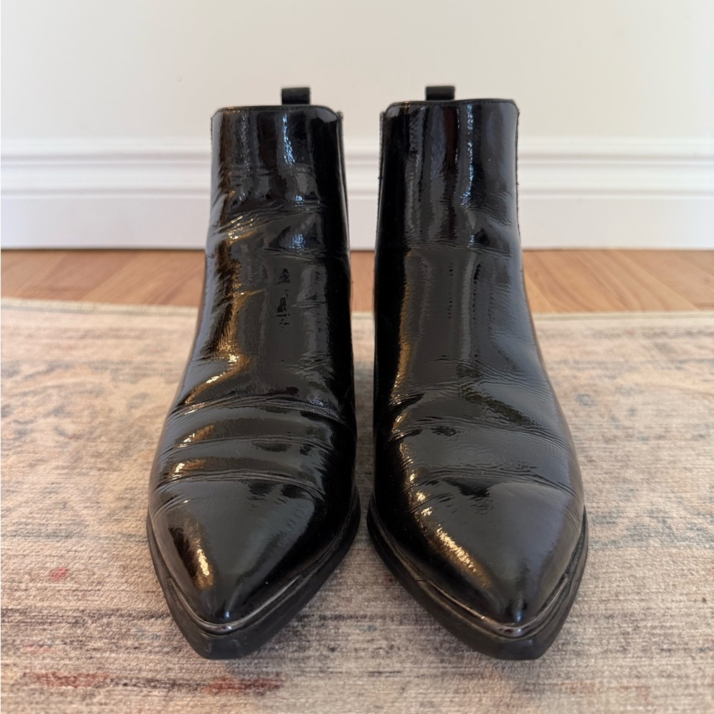 Woman’s Black Leather Ankle Boots